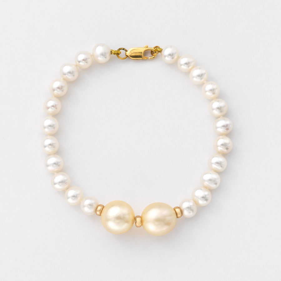 PULSERA PERLA CULTIVADA MEDIANA CON CALABAZOS AUSTRALIANOS